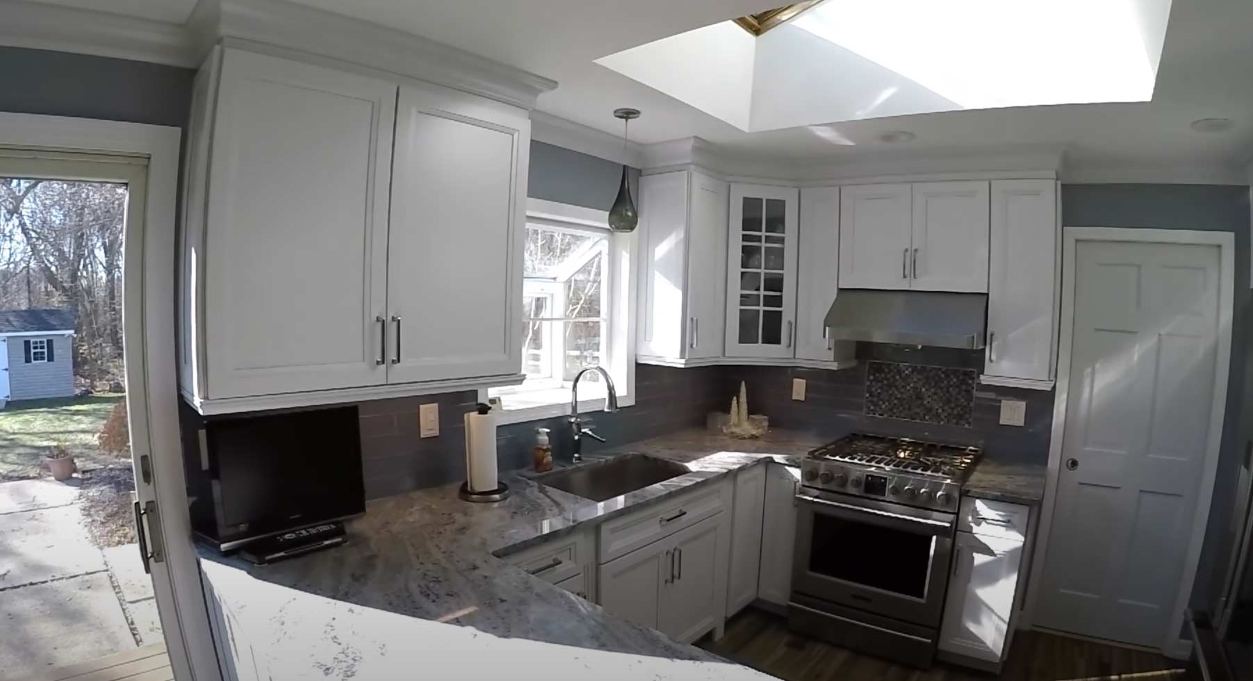 White and grey U-Shaped kitchen layout idea